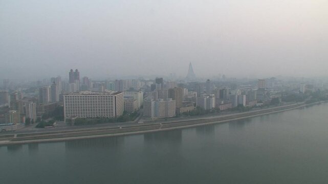 Taedong river from Yanggakdo hotel towards city centre, Pyongyang, North Korea