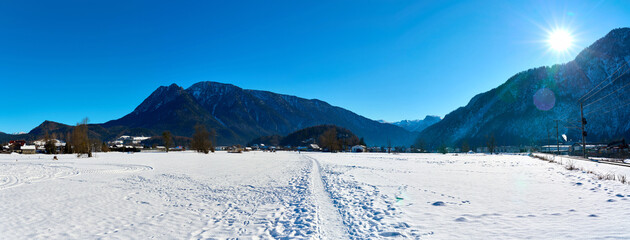 Beautiful Austrian Winter Landscape with Field, Mountains and Pathway. Bad Goisern, Upper Austria.