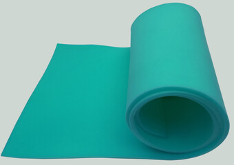 one roll of bright blue thin sponge foam isolated on white background