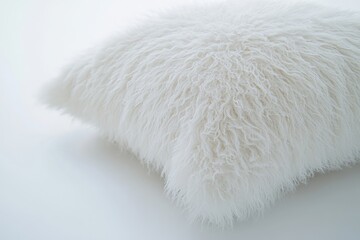 Soft White Fluffy Pillow on a Light Background for Cozy Interiors