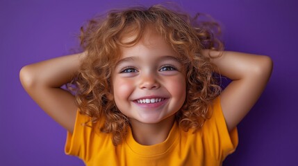 Joyful Girl with Curly Hair in Orange Shirt