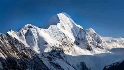 Obraz premium Awe-inspiring and grandeur-inducing sight of a snow-covered mountain. Serene and Majestic Snowy Mountain in Stunning Natural Light. Awe-Inspiring Frozen Mountain Range in a Tranquil Atmosphere.