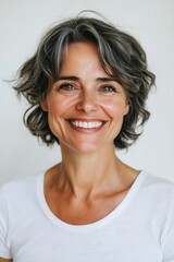 Happy Mature Woman with Short Gray Hair Smiling