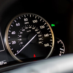 Inside the car.Speedometer and tachometer of the car.Dashboard, inner workings of a car.