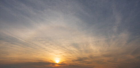Dramatic sunrise cloud blue sky with orange sunshine