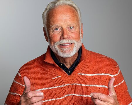 In a warm studio, a senior man extends a gesture of heartfelt welcome, his arms open wide in a display of geniality He leans back slightly, creating an inviting and receptive posture The background