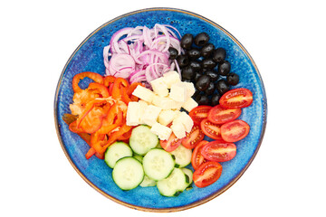 Greek salad with Cherry tomatoes, cucumber, peppers, olives, Greek feta cheese, red onions in the blue plate with white background