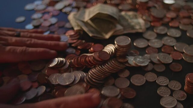 Knocking over Stacks of Coins