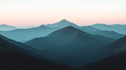 Serene Twilight Panorama: Layers of Misty Mountains at Dusk