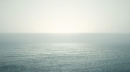 Fototapeta premium Calm Sea Under a Misty Sky