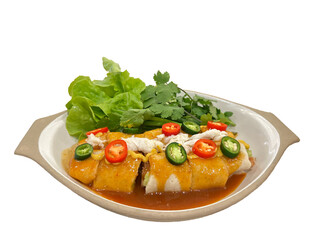 Fresh spring rolls served with tamarind sauce and spices on white background. Thai food concept.