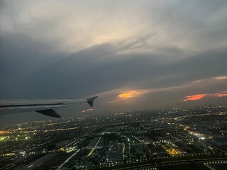 time lapse clouds over the city at night