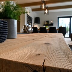 Fototapeta premium The warm elegance of a smooth wooden table is captured in this image The natural grain details are prominently displayed, inviting touch and admiration Its soft, blurred background hints at a cozy
