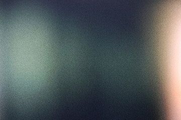 Grainy noise texture background, abstract orange green vibrant glowing color gradient shape on black backdrop, dark banner poster header cover wallpaper design