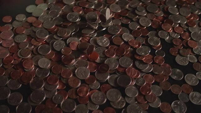 Slow Motion USD Coins Falling