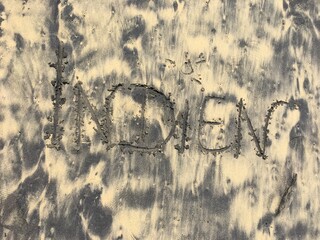 Indien in Sand geschrieben 
