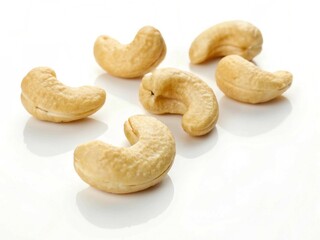 Fototapeta premium Cashew nuts on white background. Suitable for marketing or business purposes