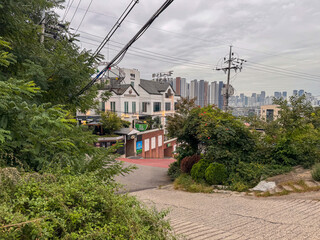 Hillside View of a City with Residential and Commercial Buildings