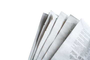 Close-Up of Open Newspaper Pages. High angle view, isolated on transparent background.