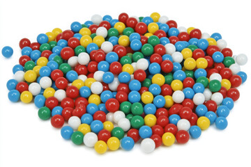 Obraz premium A colorful assortment of small, round candy-coated chocolates in red, blue, green, yellow, and white, creating a vibrant and playful display.