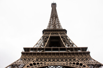Eiffel Tower or Tour Eiffel  is a wrought iron lattice tower on the Champ de Mars in Paris, France