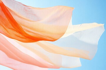 close-up of festive and colorful traditional mexican paper banners fluttering against clear blue sky