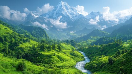 Naklejka premium Majestic snow-capped mountains overlook a lush green valley with a river.