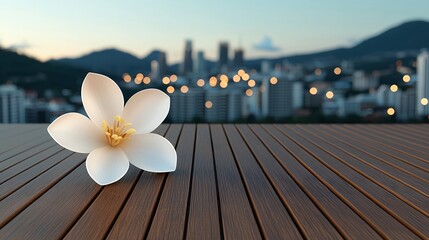 White Flower on Dark Wood Deck with City Dusk Background