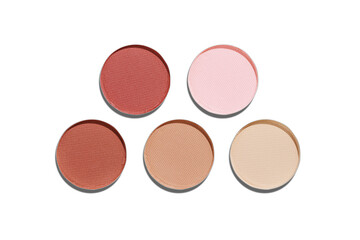 Set of colorful Swatches eyeshadow refills. Close-up of matte pans beige brown neutral pastel shade isolated on white background with shadows, detailed texture, cosmetic, beauty product, makeup