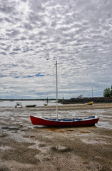 Calm waters at Burrum Heads with sailing boat