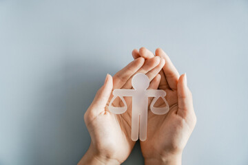 Hand holding  Ethical model, business ethics and corporate compliance concept
