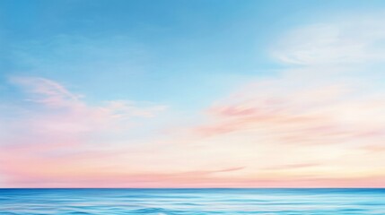 Coastal view, blue sky, pink clouds over serene ocean at sunset