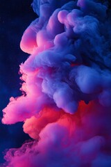 Fototapeta premium Vibrant pink and blue smoke plume against a dark background. Intricate swirling patterns