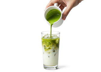 pouring matcha into iced milk glass