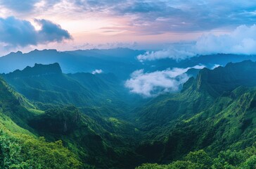 Obraz premium Serene Landscape of Lush Mountains and Rolling Clouds Under a Tranquil Sky at Dawn in a Remote Natural Haven
