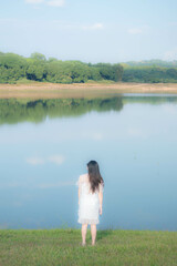 young woman on the river