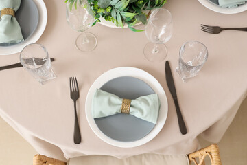 Beautiful Christmas table setting with mistletoe. Top view