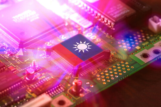 Taiwan flag on a CPU processor. Taiwanese Chip manufacturer, GPU microchip on a motherboard.