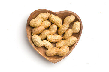heart shaped bowl with peanuts in shells