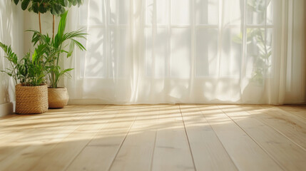 Bright and airy interior with wooden floor, potted plants, and sheer curtains creating serene atmosphere. Natural light enhances peaceful ambiance