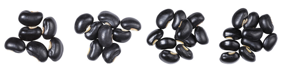 Black beans close up, isolated on white background, top view.	
