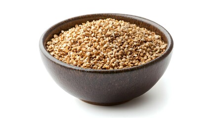 Bowl of buckwheat flakes isolated on white