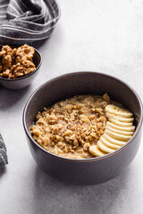 oatmeal porridge with banana, honey and walnuts