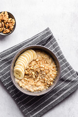 oatmeal porridge with banana, honey and walnuts