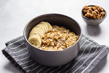 oatmeal porridge with banana, honey and walnuts