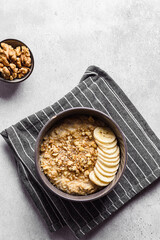 oatmeal porridge with banana, honey and walnuts