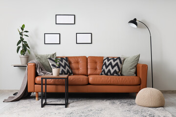 Comfortable sofa and coffee table in interior of modern living room