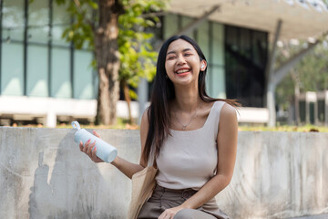 Sustainable lifestyle. Happy woman with a reusable cup and a smile.