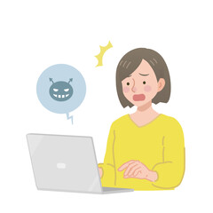 パソコンを見てショックを受ける女性