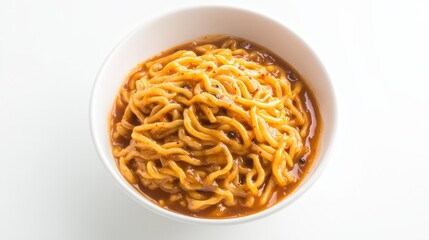A bowl of spicy korean jajangmyeon black bean sauce noodles ready to be enjoyed against a clean background